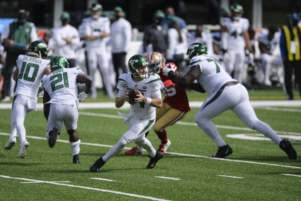 New York Jets quarterback Sam Darnold (14) looks to pass during the first half of an NFL football game against the San Francisco 49ers, Sunday, Sept. 20, 2020, in East Rutherford, N.J. (AP Photo/Bill Kostroun)