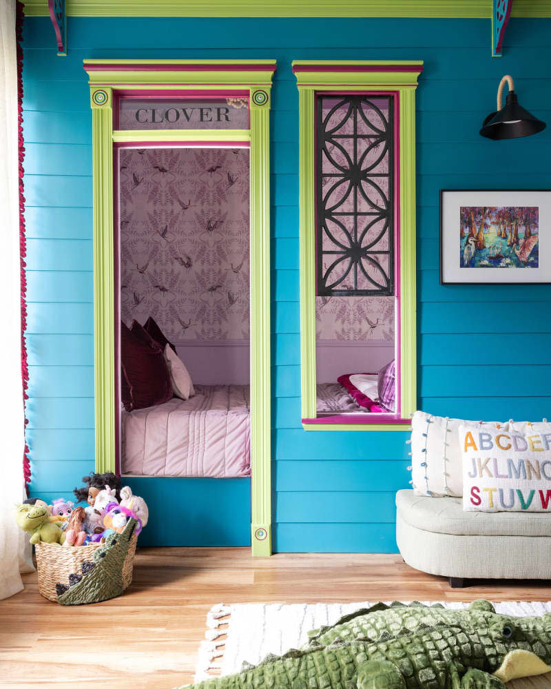 Turquoise and green kids room with 2 separate bed nooks
