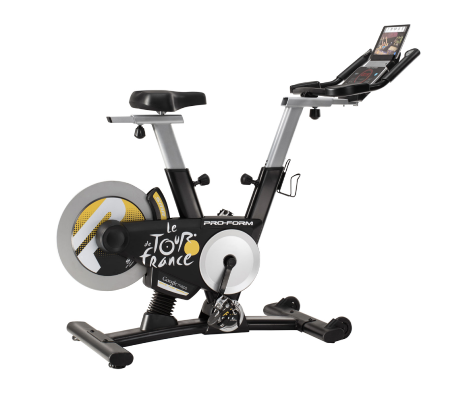 ProForm Tour de France Exercise Bike with yellow wheel and tablet on bike (Photo via Best Buy Canada)