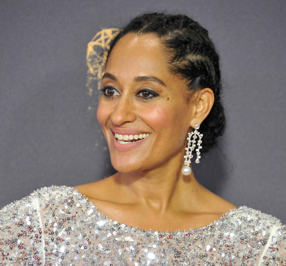 <p>A cornrowed chingnon with droplet earrings is a simple yet chic way to steal the scene at your next holiday party. (Photo: Getty Images) </p>