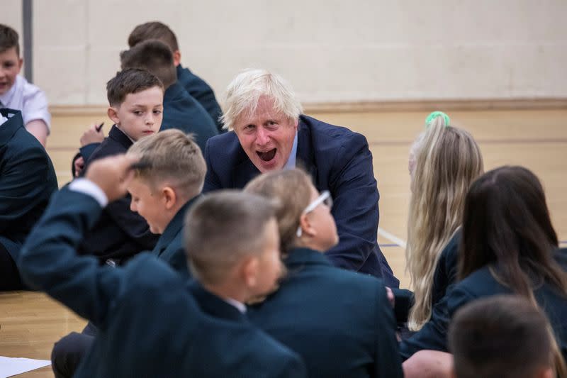 Britain's Prime Minister Boris Johnson visits Castle Rock school on the pupil's first day back to school, in Coalville