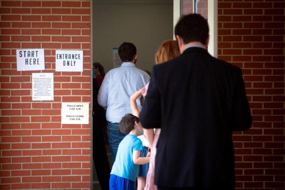Residents line up to vote during the primary election Tuesday at St. Paul United Methodist in Columbus. For election results, visit ledger-enquirer.com. Madeleine Cook/mcook@ledger-enquirer.com