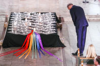 Prime Minister Jonas Gahr Store pays respect during a service in Oslo Cathedral, Oslo, Sunday June 26, 2022, after an attack in Oslo on Saturday. A gunman opened fire in Oslo’s nightlife district early Saturday, killing two people and leaving more than 20 wounded in what the Norwegian security service called an "Islamist terror act" during the capital’s annual LGBTQ Pride festival. (Javad Parsa/NTB via AP)