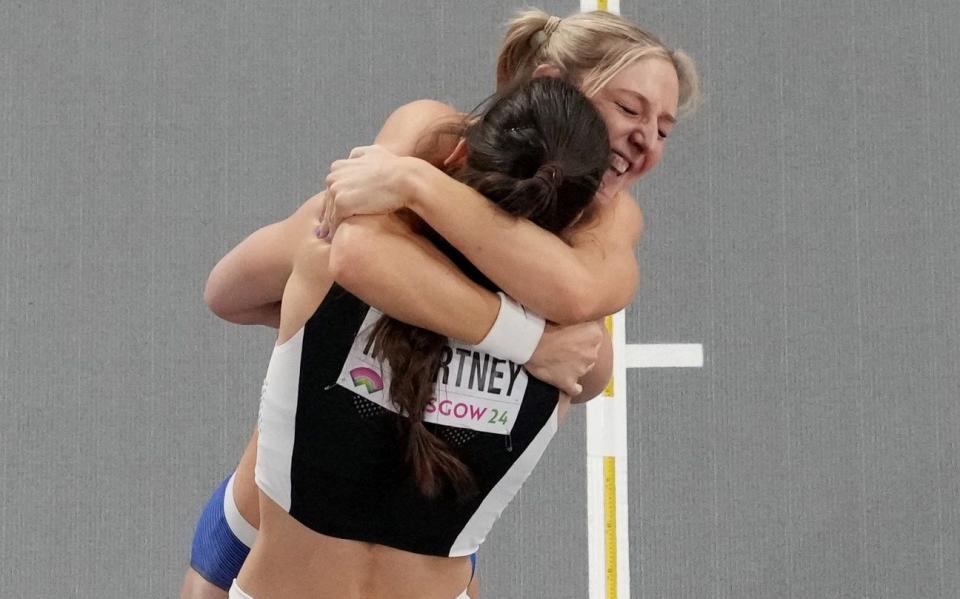 Molly Caudery hugs Eliza McCartney