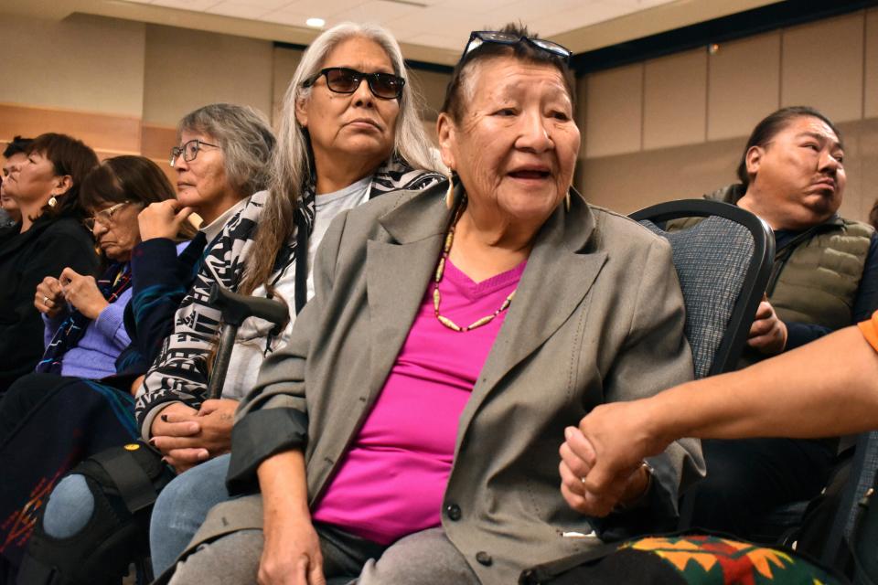 Myrna Burgess, with the Northern Cheyenne Tribe in southeastern Montana, speaks to someone at an event where she shared her experiences of abuse when she was a child at a Native American boarding school, during a U.S. Department of Interior listening session at Montana State University, Sunday, Nov. 5, 2023, in Bozeman, Mont. The Interior Department says more than 400 of the government-backed schools operated across the U.S. (AP Photo/Matthew Brown)