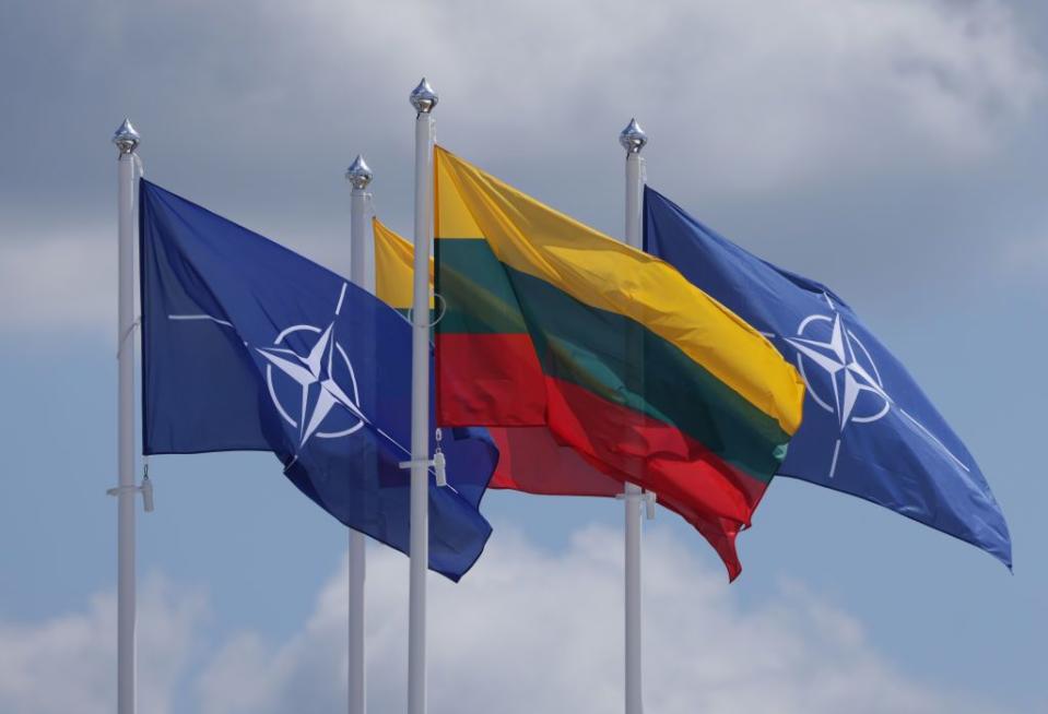 The NATO and Lithuanian flags fly over the summit venue on July 09, 2023 in Vilnius, Lithuania. (Sean Gallup/Getty Images)