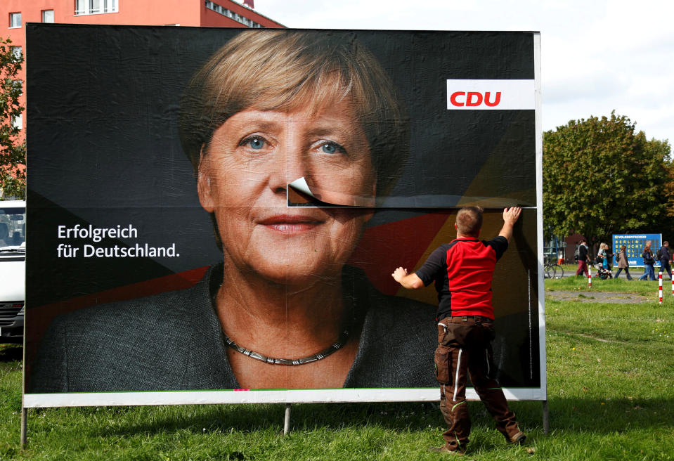 More than half of the men in Germany described themselves as moderately satisfied with their work, compared with the 59% EU average, according to a survey. Photo: Fabrizio Bensch/Reuters
