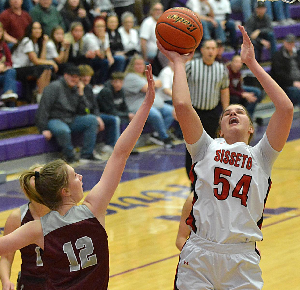 Sisseton's Krista Langager shoots over Tri-Valley's Madelyn Wenzel during their Class A SoDak 16 girls basketball game on Thursday, Feb. 29, 2024 in the Watertown Civic Arena. Sisseton won 63-52.