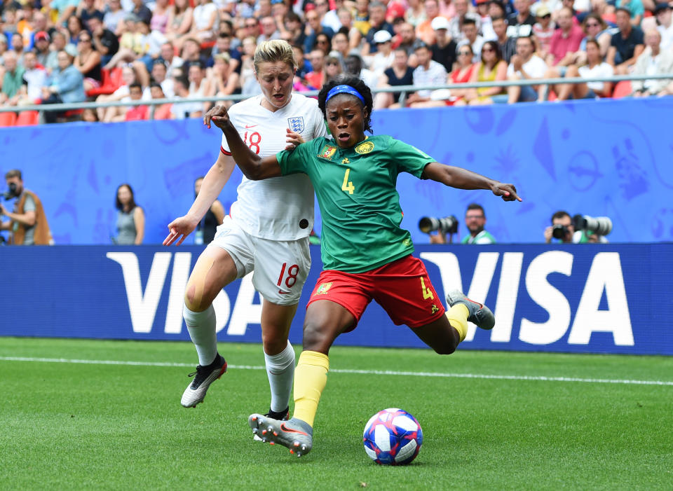 Ellen White of England battles for possession with Yvonne Leuko of Cameroon during the 2019 FIFA Women's World Cup France Round Of 16 match between England and Cameroon at Stade du Hainaut on June 23, 2019 in Valenciennes, France. (Photo by Alex Caparros - FIFA/FIFA via Getty Images)