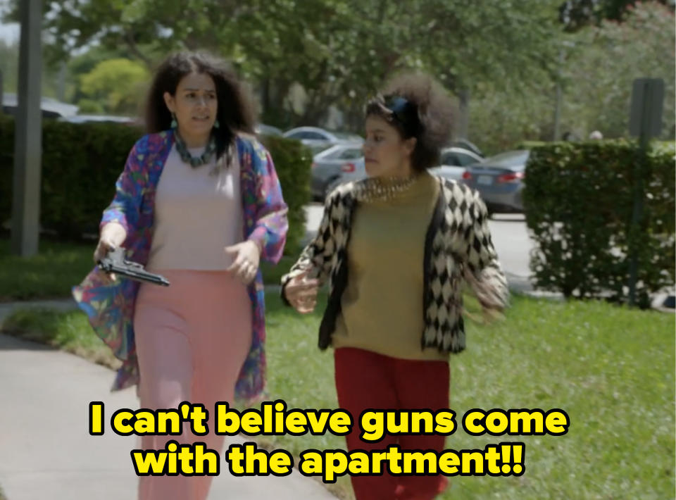 woman walking outside saying, i can't believe guns come with the apartment