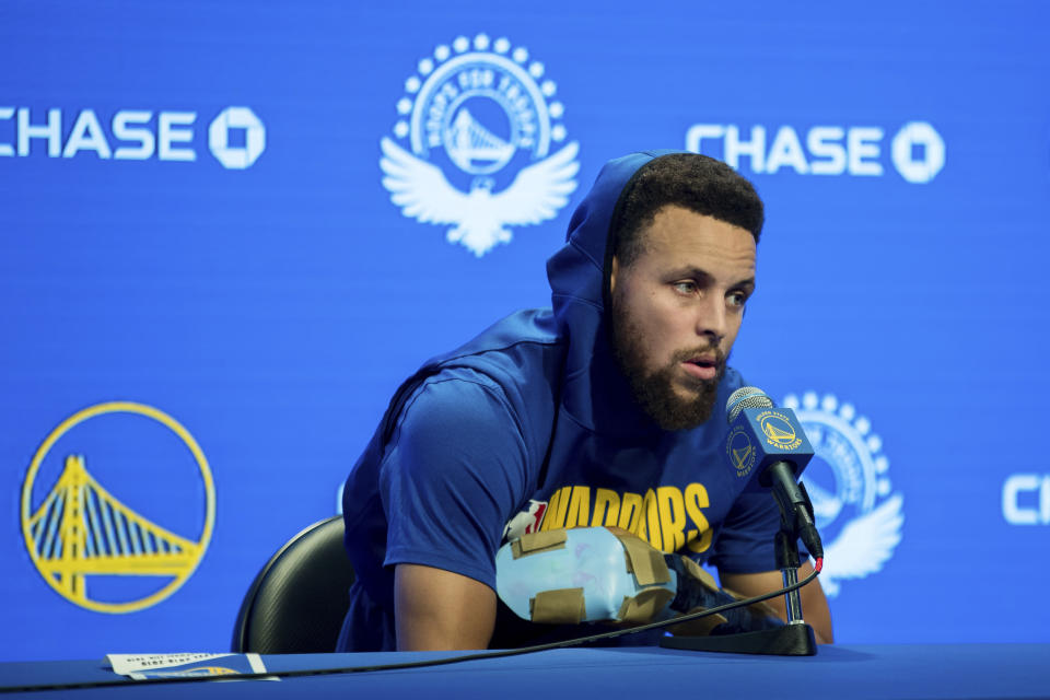 Golden State Warriors' Stephen Curry gives a press conference before an NBA basketball game against the Utah Jazz in San Francisco, Monday, Nov. 11, 2019. (AP Photo/John Hefti)