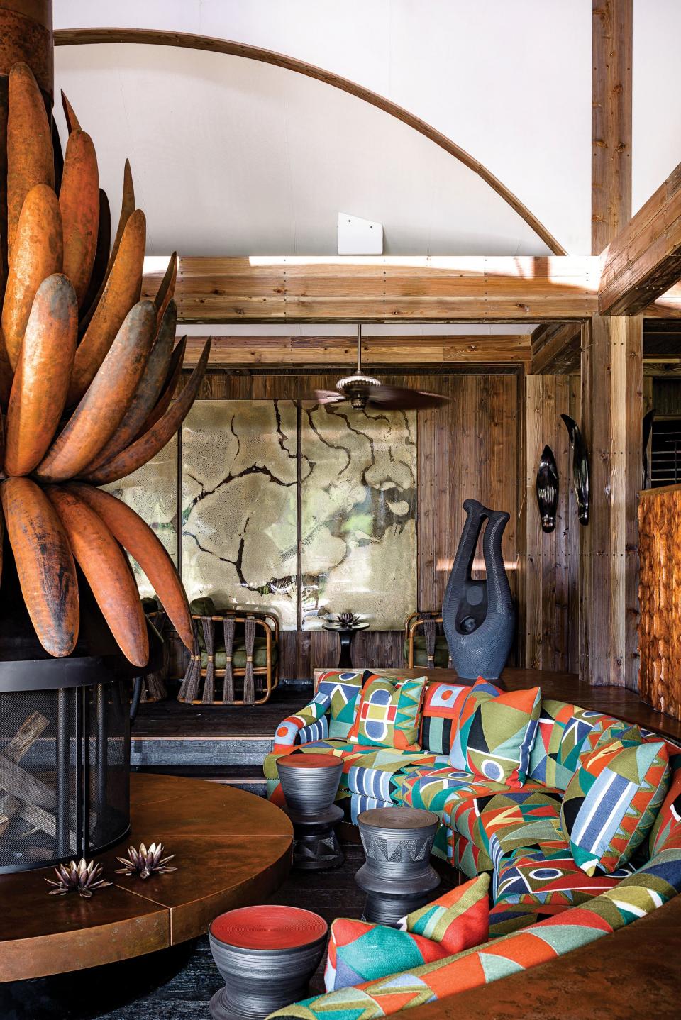 a lounge at Xigera Safari Lodge, now home to a collection of contemporary African art and design.