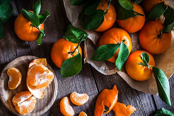 Fruit Delivery Service, Tangerines on a wooden table