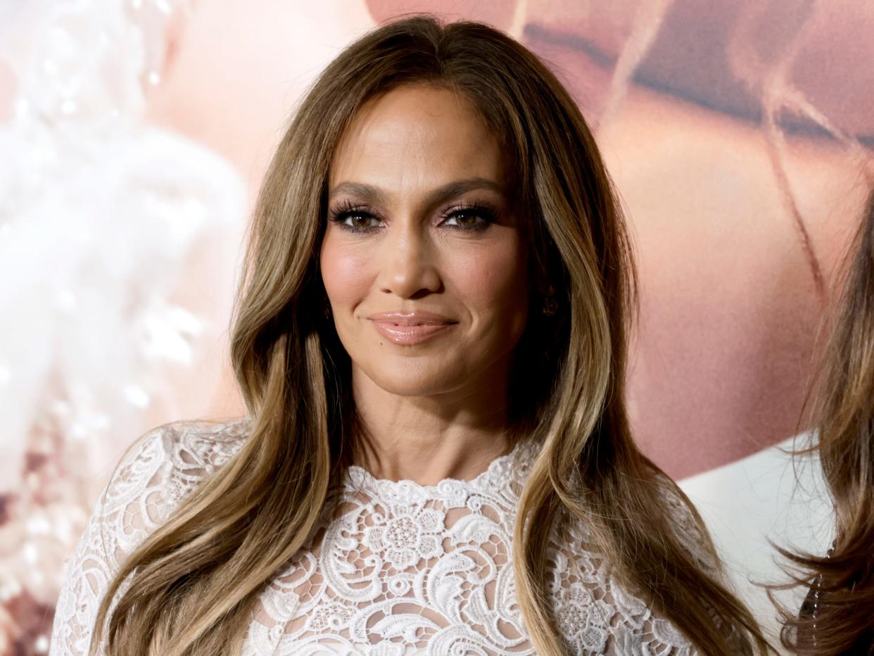 Jennifer Lopez in a lacy white dress