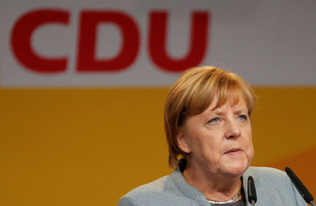 German Chancellor Angela Merkel, a top candidate of the Christian Democratic Union Party (CDU) for the upcoming general elections, speaks during an election rally in Dillingen, Germany, September 15, 2017. REUTERS/Wolfgang Rattay