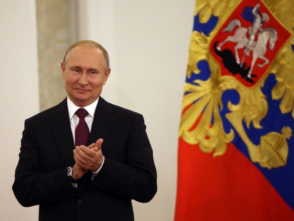 Russian President Vladimir Putin applauds during the State Awards Ceremony at the Grand Kremlin Palace in Moscow, Russia, June,12,2019