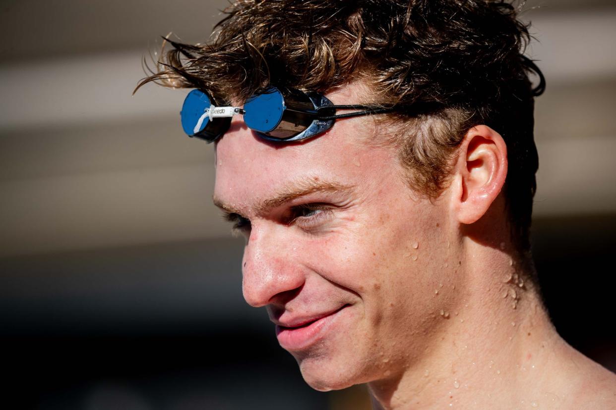 Jan 6, 2024; Tempe, Arizona, United States; Arizona State Sun Devil Leon Marchand speaks to members of the media after swimming against the Grand Canyon Lopes at Mona Plummer Aquatic Complex in Tempe on Jan. 6, 2024.