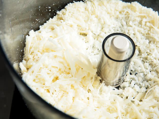 <p>Serious Eats / Vicky Wasik</p> In a similar outcome to the potato test, the better food processors uniformly grated cheese, leaving little waste trapped between the disk and the lid.