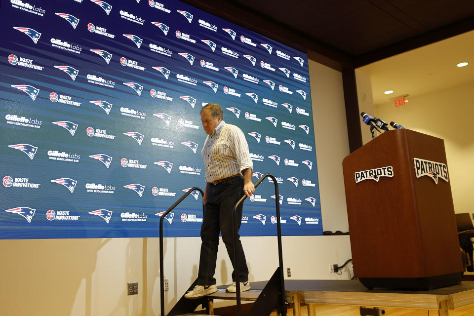 New England Patriots head coach Bill Belichick exits after speaking during a news conference Sunday after a game against the New York Jets at Gillette Stadium. (Photo by Winslow Townson/Getty Images)