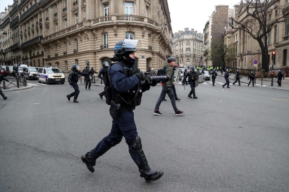 A French police officer holds a non-lethal hand-held weapon (LBD40) during a demonstration on Saturday (AFP/Getty Images)