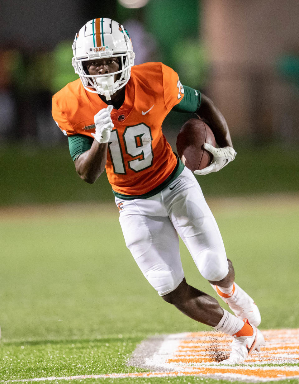 Florida A&M University wide receiver Xavier Smith (19) runs the ball during a game between Florida A&M University and Fort Valley State University at Bragg Memorial Stadium in Tallahassee Saturday, Sept. 11, 2021.