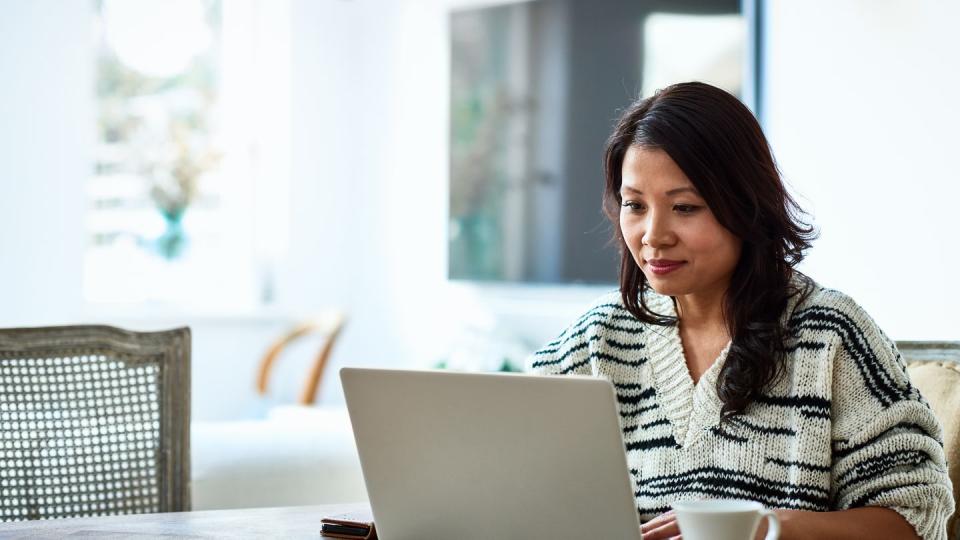 woman using laptop and working from home