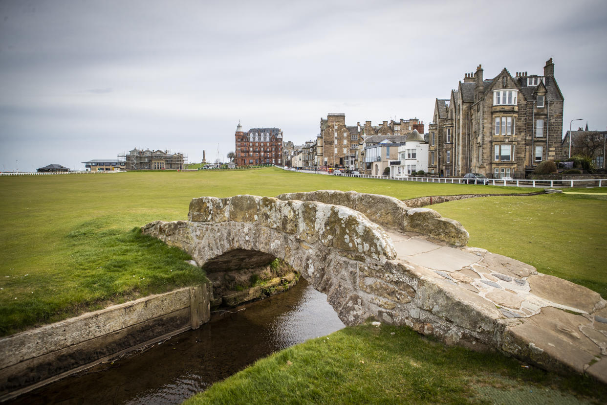 The Royal and Ancient Golf Club and Swilcan Bridge on the Old Course at St Andrews in Scotland. Known as the home of golf, the oldest and most iconic golf course in the world will host the 150th Open in 2022 following this years Open at Royal St George�s in Kent being postponed until next year.