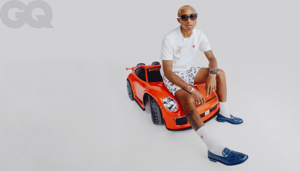 <cite class="credit">Shirt, $65, (for pack of three), boxers, $65, and sunglasses $229, by Human Made / His own shoes, by Chanel Pharrell / His own watch, by Richard Mille / Brooch, (price upon request), by Lorraine Schwartz</cite>