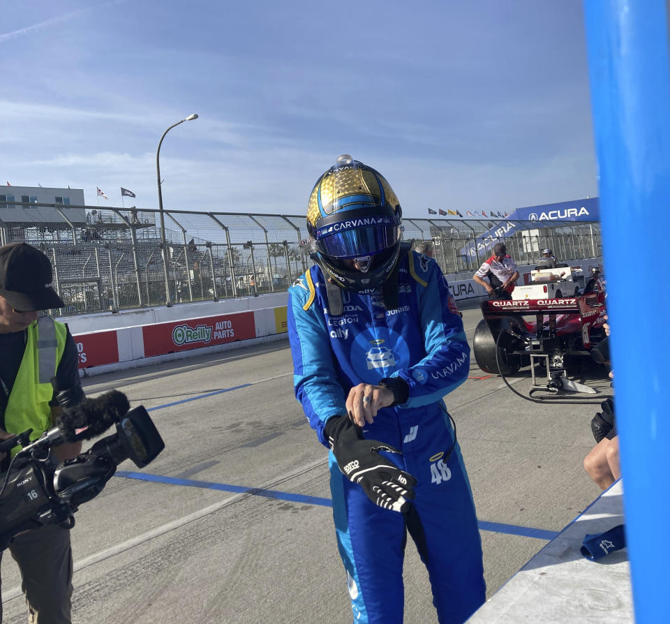 Jimmie Johnson prepares for practice at the Grand Prix of Long Beach, Calif., on Saturday, April 9, 2022. Johnson fractured his hand in a crash on Friday and was fitted with a carbon fiber splint that he tested in Saturday practice. (AP Photo/Jenna Fryer)