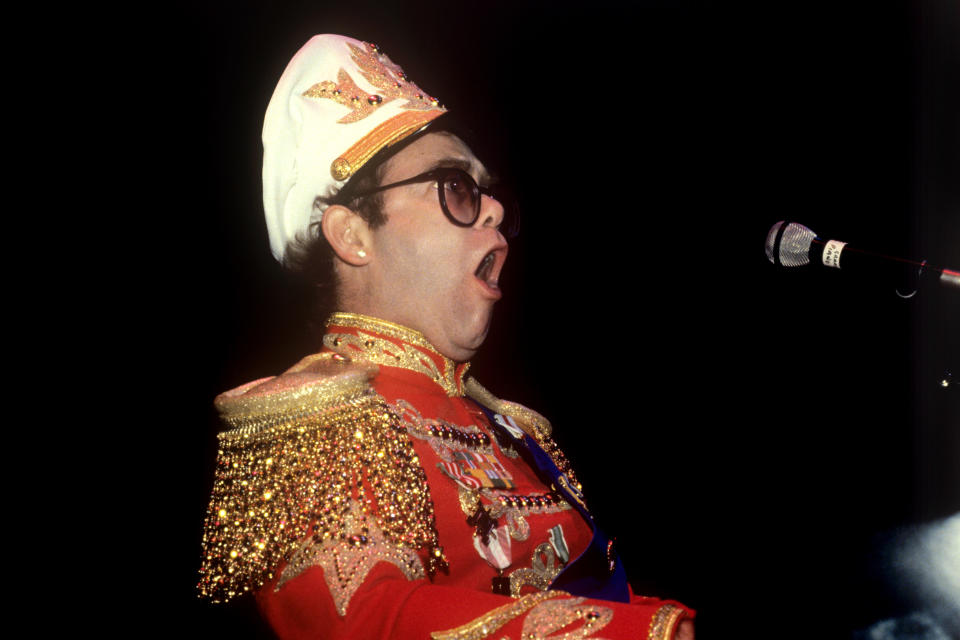 The Ruritanian look for the pop singer Elton John, showing his new uniform in London, that will be his hallmark for his British tour.