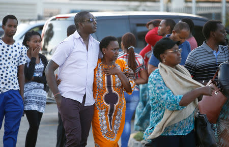 Relatives leave the information centre following the Ethiopian Airlines Flight ET 302 plane crash, at the Jomo Kenyatta International Airport (JKIA) in Nairobi, Kenya March 10, 2019. REUTERS/Baz Ratner