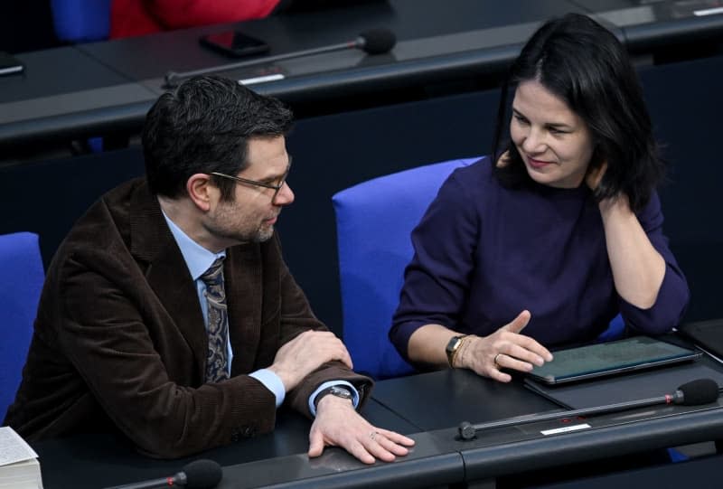 German Minister of Justice Marco Buschmann and German Minister for Foreign Affairs Annalena Baerbock attend a plenary session to discuss the second Budget Financing Act 2024 at the German Bundestag. Britta Pedersen/dpa