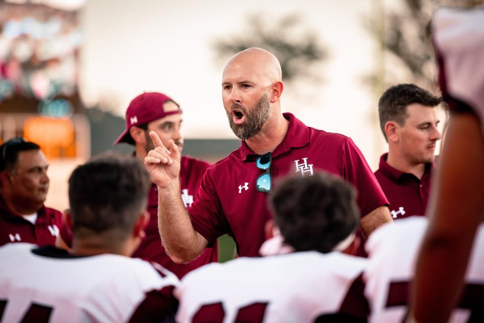 Hereford coach Adam Naron speaks to his team during a nondistrict game Thursday, Aug. 26, 2021, against Caprock at Dick Bivins Stadium in Amarillo.