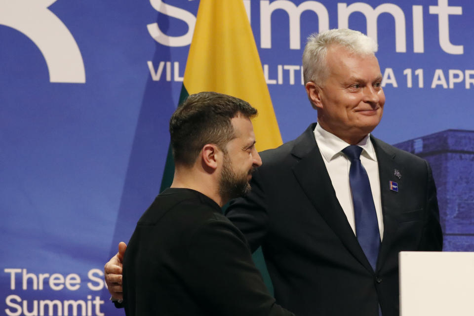 FILE - Ukraine's President Volodymyr Zelenskyy, left, stands with Lithuania's President Gitanas Nauseda after addressing a media conference at the Palace of the Grand Dukes of Lithuania during the Three Seas Initiative Summit and Business Forum in Vilnius, on April 11, 2024. Lithuania is holding a presidential election on Sunday May 12, 2024 at a time when Russian gains on the battlefield in Ukraine are fueling greater fears across all of Europe about Moscow's intentions, but particularly in the strategically important Baltic region. (AP Photo/Mindaugas Kulbis, File)