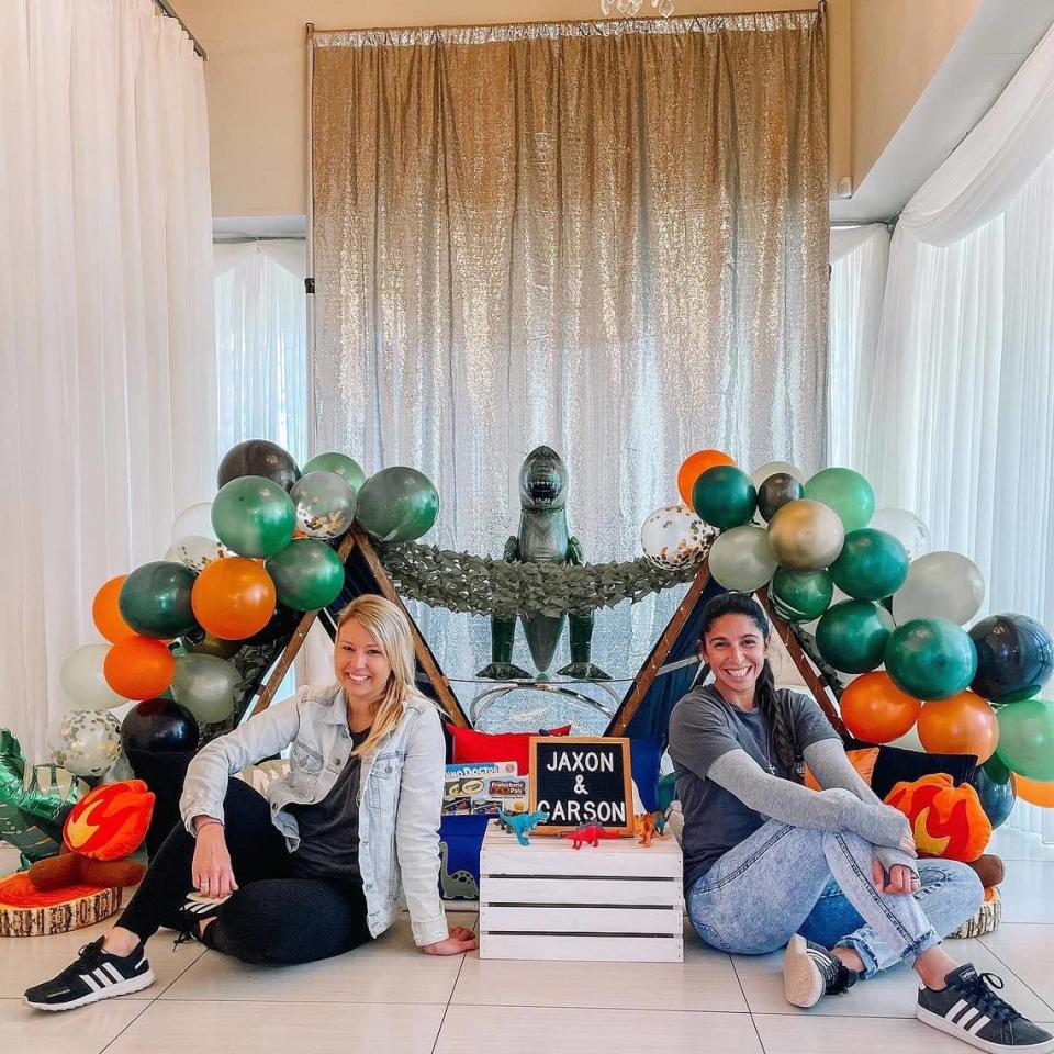 Kristin Cummings and Erika Johnson, founders of St. Pete Slumber Company, set up this dinosaur-themed “kids corner’’ to keep two boys entertained during a wedding.