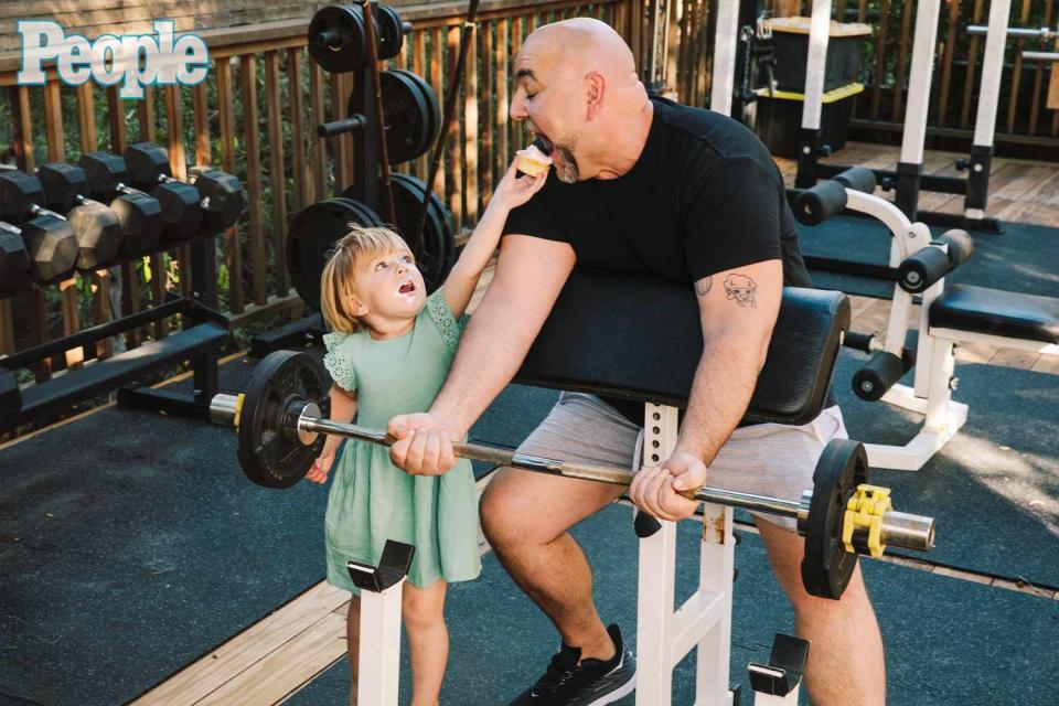 <p><a href="https://www.instagram.com/chris.mc.pherson/">Chris McPherson</a></p> Duff Goldman in his outdoor gym with daughter Josephine, 2.