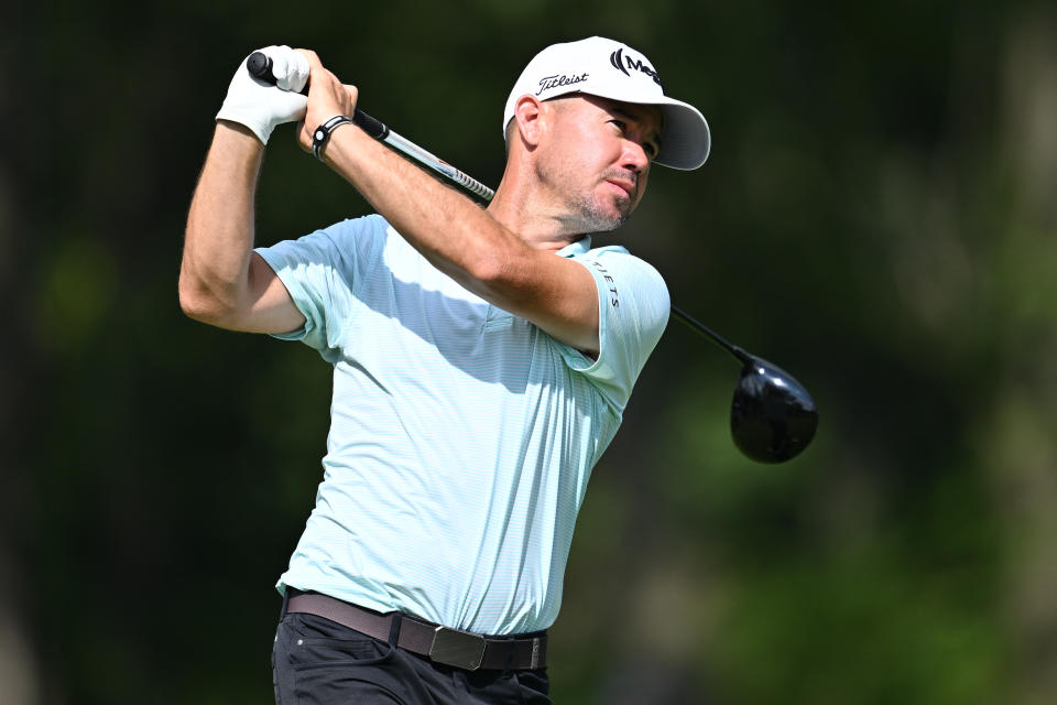 Brian Harman tees off from the 15th tee during the first round of the BMW Championship golf tournament. Mandatory Credit: Jamie Sabau-USA TODAY Sports