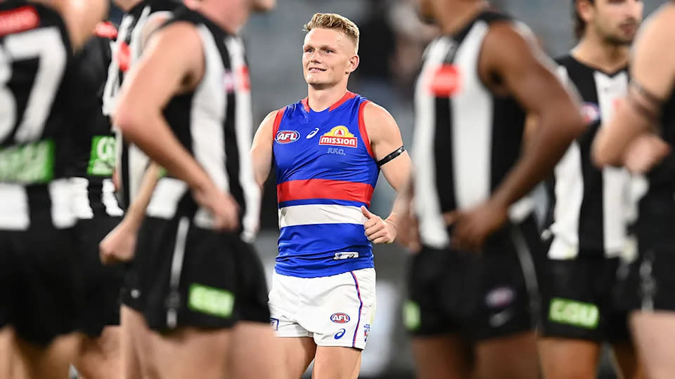 Adam Treloar celebrates after the Western Bulldogs beat Collingwood in his first game against his former club. Pic: Getty