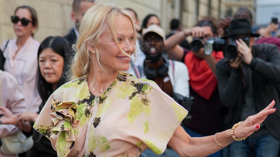  Pamela Anderson attended Paris Fashion Week without a stitch of makeup . 