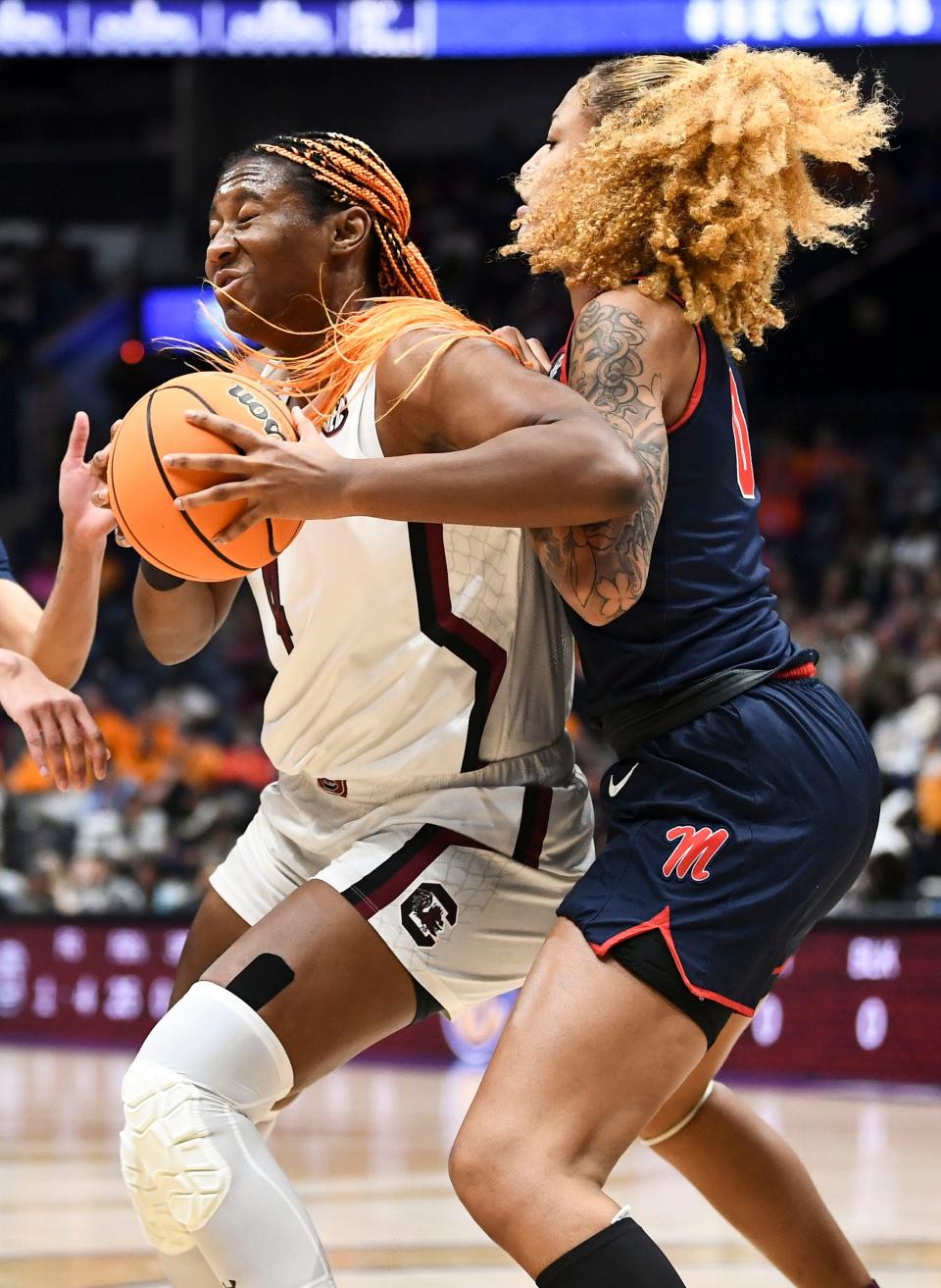 South Carolina forward Aliyah Boston (4) and Ole Miss center Shakira Austin (0) compete as the teams face off in their semifinal game in the SEC tournament at Bridgestone Arena in Nashville, Tenn., Saturday, March 5, 2022.
