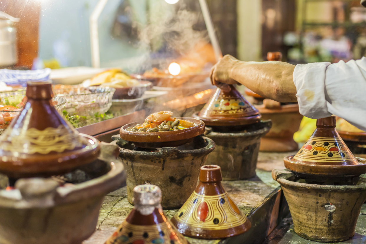 Street Food Cooking in Moroccan Tajines, Marrakech, Morocco