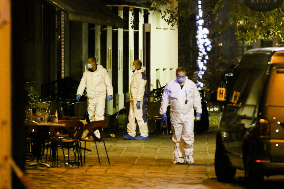 Three persons investigate at the scene following gunfire on people enjoying a last evening out before lockdown in the Austrian capital Vienna, Tuesday, Nov. 3, 2020. Police in the Austrian capital said several shots were fired shortly after 8 p.m. local time on Monday, Nov. 2, in a lively street in the city center of Vienna. Austria's top security official said authorities believe there were several gunmen involved and that a police operation was still ongoing. (Photo/Ronald Zak)