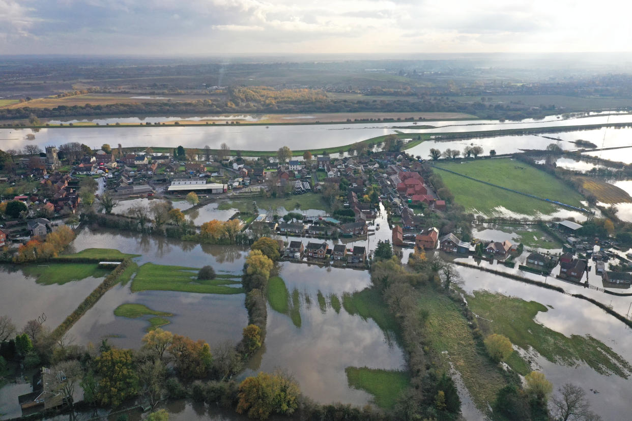 The flood water at Fishlake, in Doncaster, South Yorkshire, as parts of England endured a month's worth of rain in 24 hours, with scores of people rescued or forced to evacuate their homes.