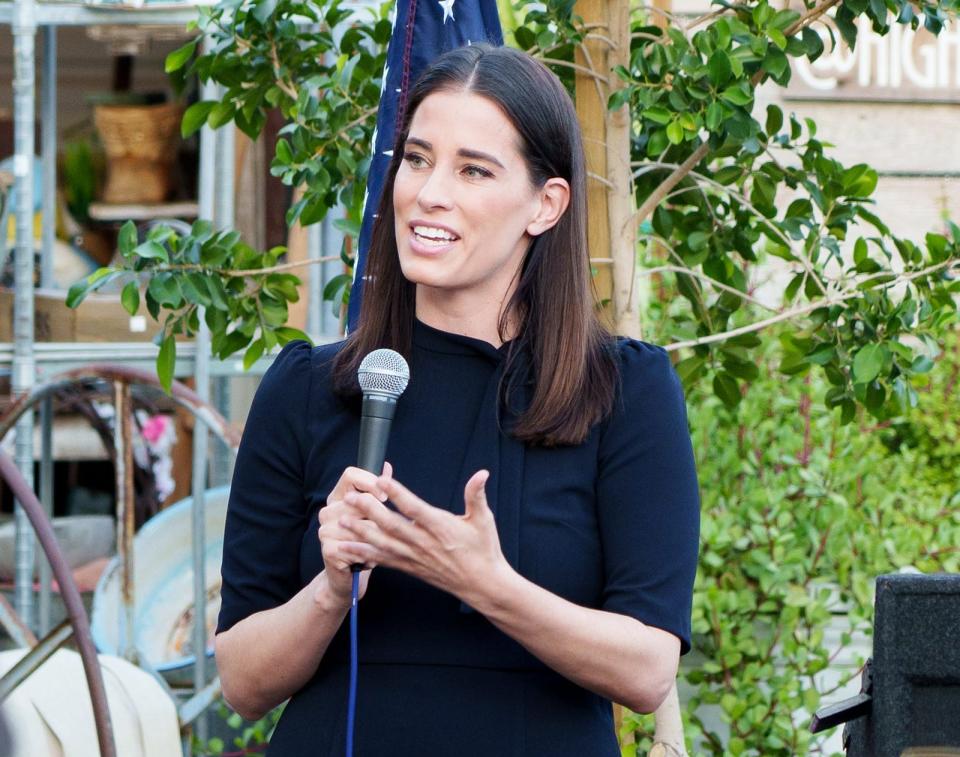 Former One America News pundit Christina Bobb speaks at an election integrity event on April 30, 2022, in Chandler, Ariz.