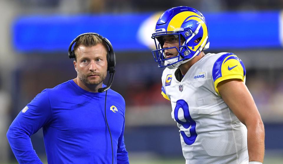 Sep 12, 2021; Inglewood, California, USA; Los Angeles Rams head coach Sean McVay talks with quarterback Matthew Stafford (9) during a time out in the fourth quarter of the game against the Chicago Bears at SoFi Stadium. Mandatory Credit: Jayne Kamin-Oncea-USA TODAY Sports