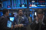 Traders work on the floor of the New York Stock Exchange, October 3, 2013. REUTERS/Brendan McDermid