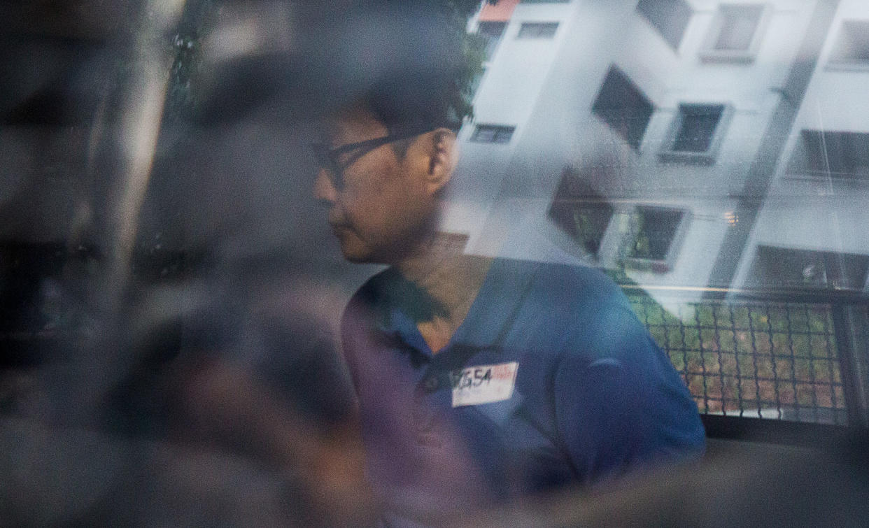 Chew Eng Han in police van on 22 February 2018. Photo: Dhany Osman/Yahoo News Singapore