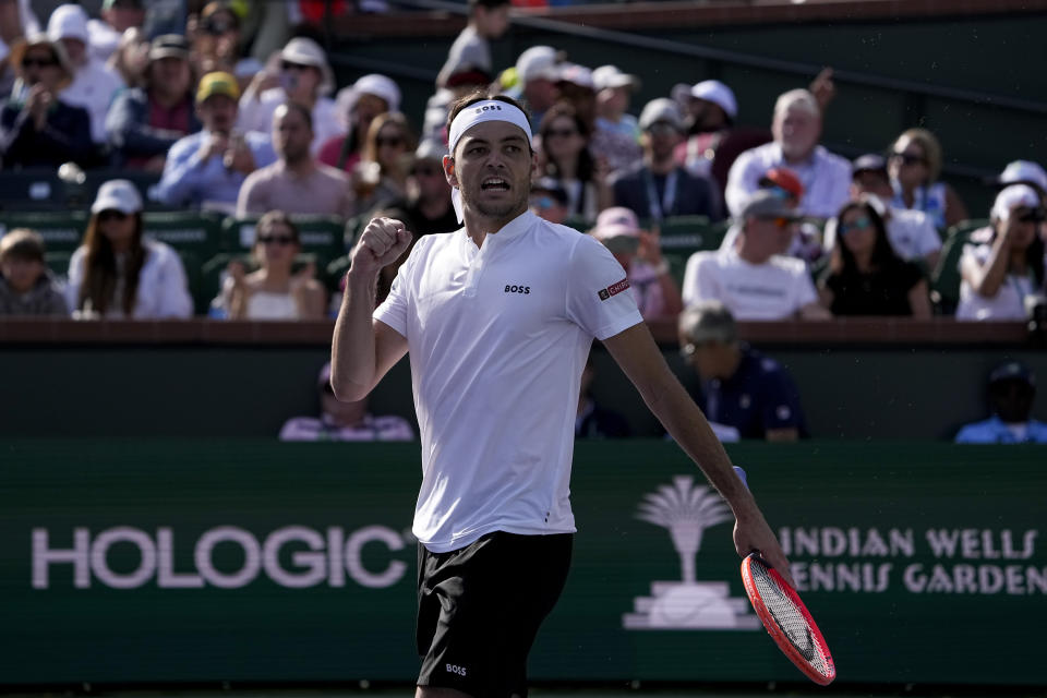 Taylor Fritz, of the United States, celebrates after defeating Alejandro Tabilo, of Chile, at the BNP Paribas Open tennis tournament, Saturday, March 9, 2024, in Indian Wells, Calif. (AP Photo/Mark J. Terrill)