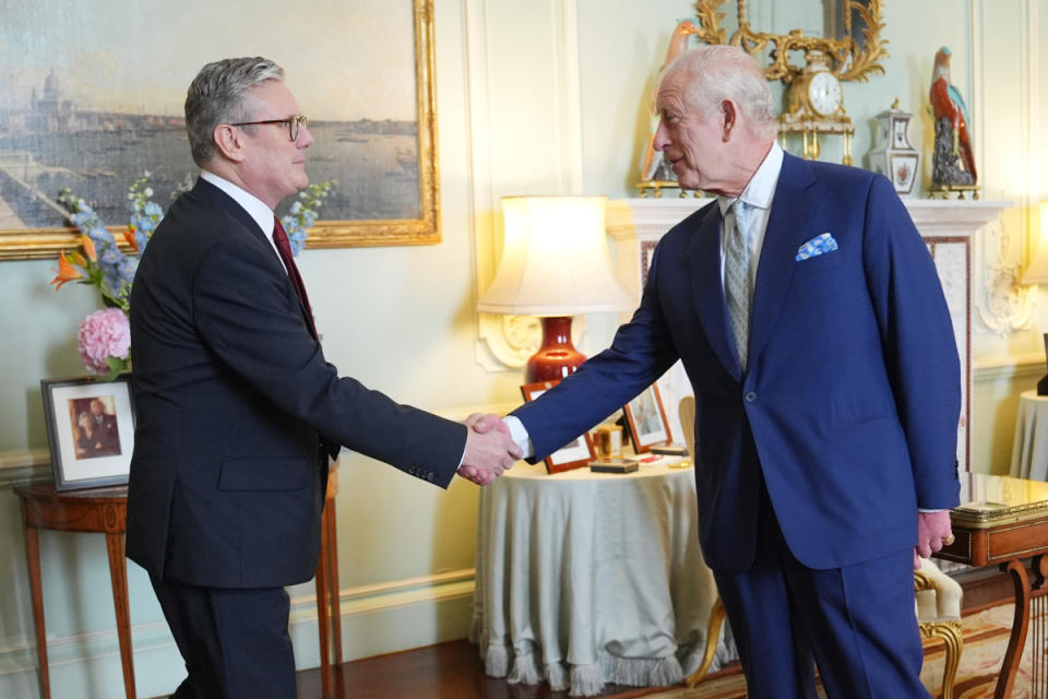 LONDON, ENGLAND - JULY 5: King Charles III welcomes Sir Keir Starmer during an audience at Buckingham Palace, where he invited the leader of the Labour Party to become Prime Minister and form a new government following the landslide General Election victory for the Labour Party, on July 5, 2024, in London, England. The Labour Party won a landslide victory in the 2024 general election, ending 14 years of Conservative government.<p>WPA Pool/Getty Images</p>