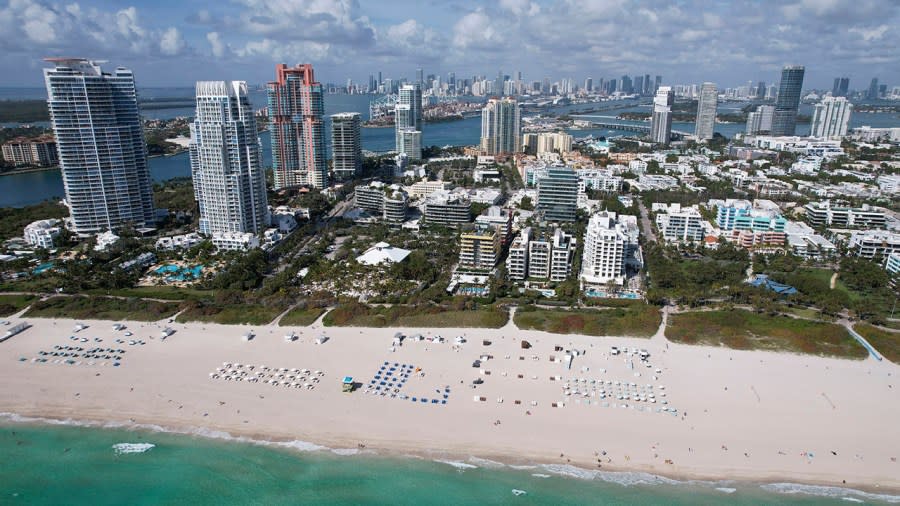 In this photo taken via drone, chairs dot the wide sandy beach, in the South Beach area of Miami Beach, Fla, Thursday, Feb. 29, 2024. (AP Photo/Rebecca Blackwell)